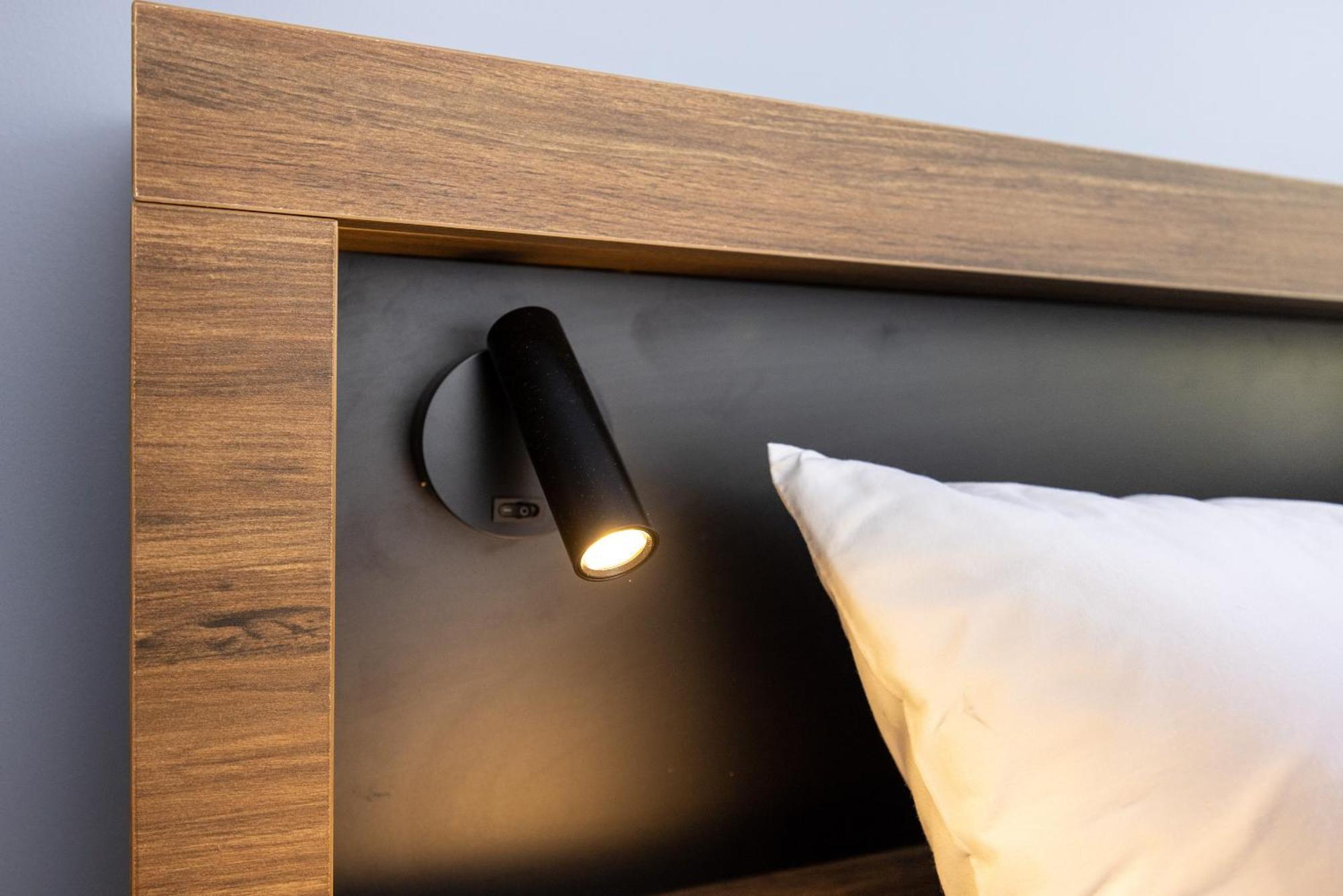 Yha ロトルアホステル エクステリア 写真 A wall-mounted reading light